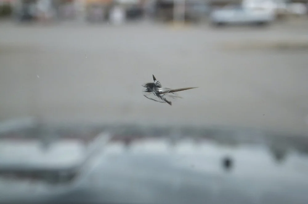 Repairable windshield rock chip